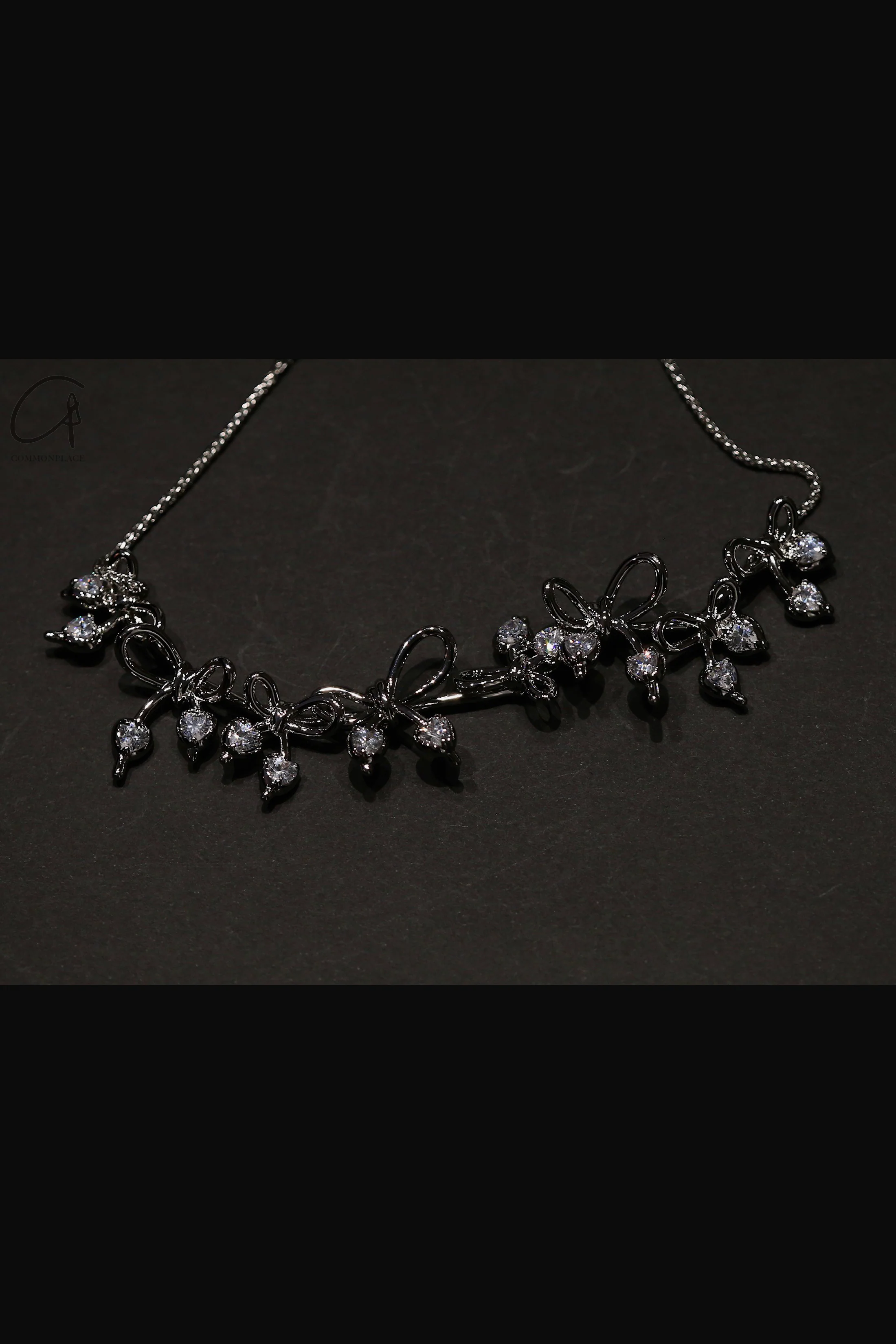 YVMINxSST Knotted Bow Metal Necklace 21355 Silver - Image 3